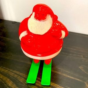 Vintage Santa on Skies hard plastic candy container.